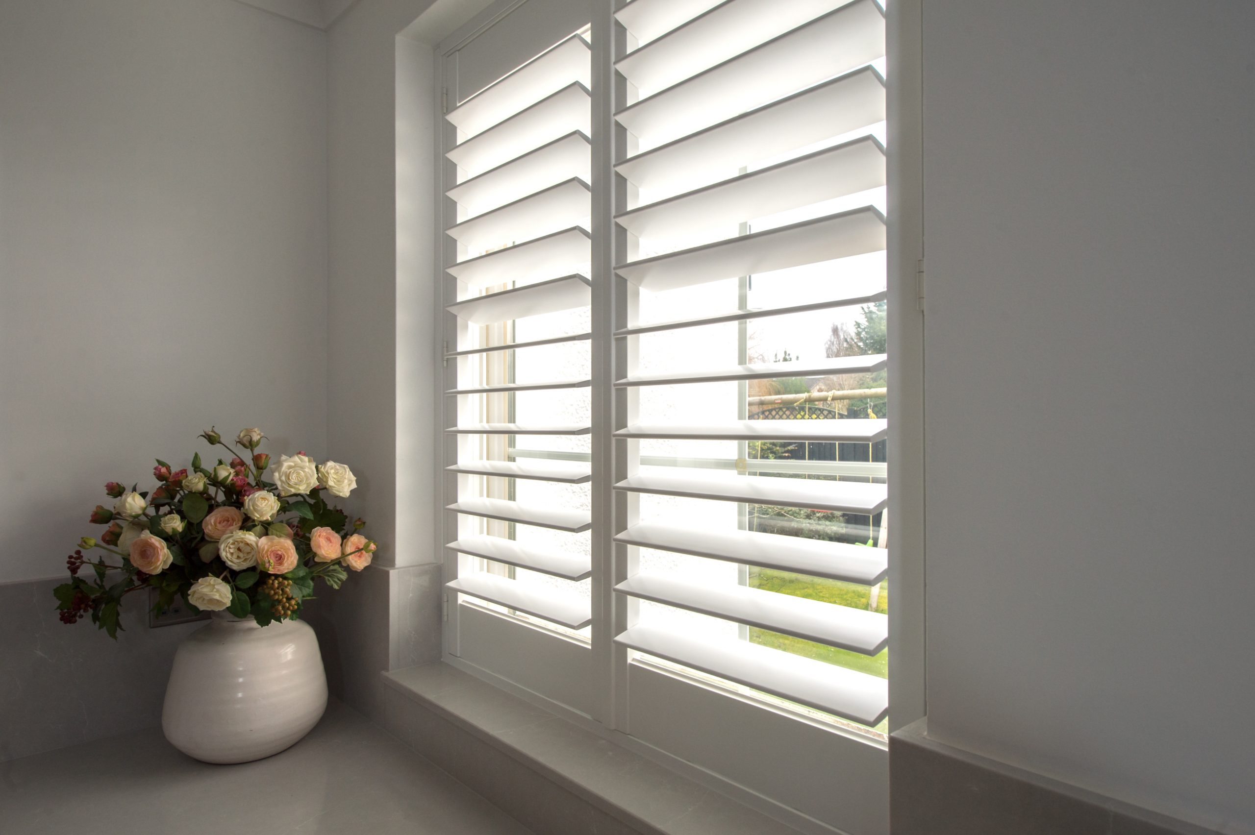 full height plantation shutters installed in watford house